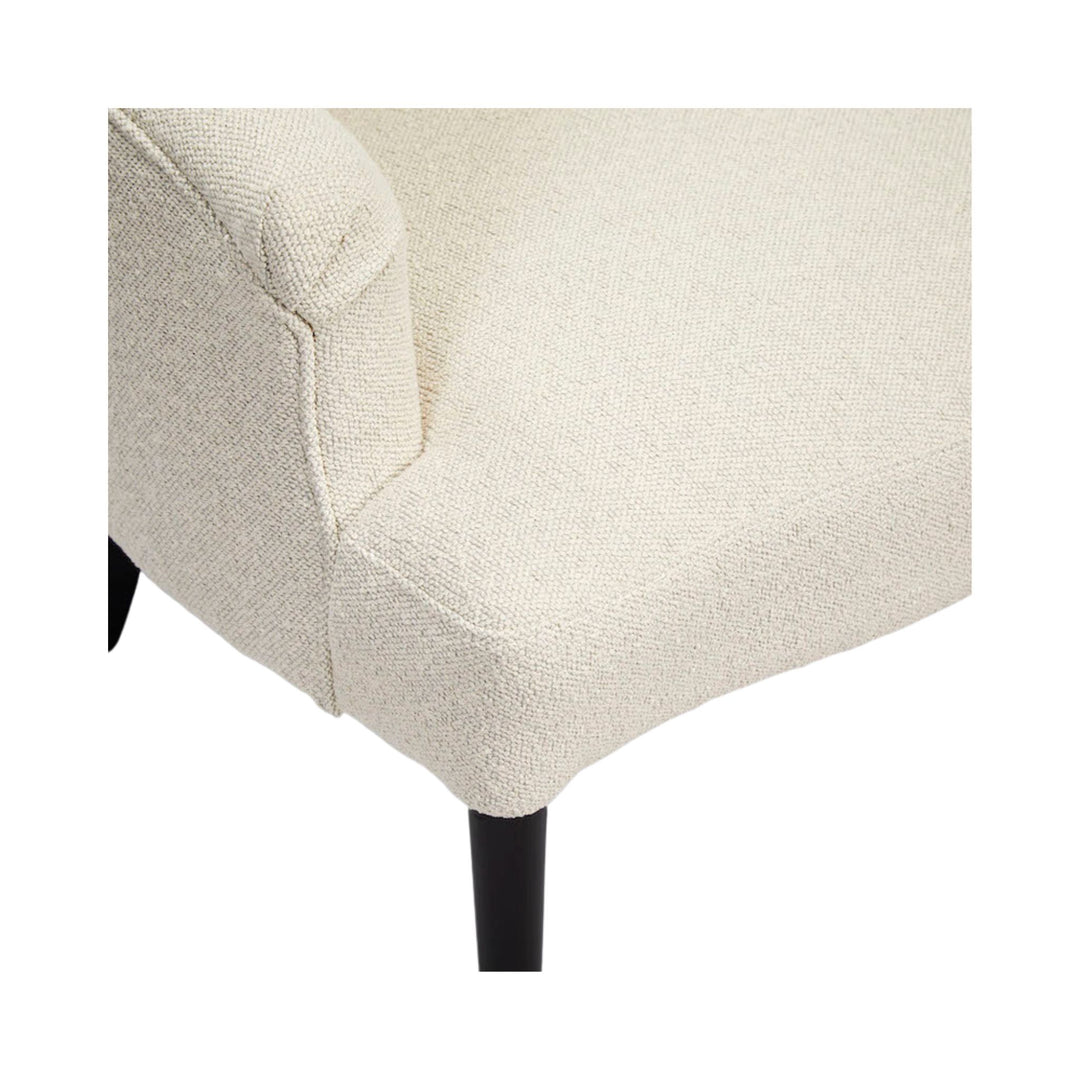 low white armchair in a white background